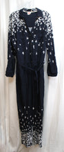 Load image into Gallery viewer, Lilka (Anthropologie) - Soft Black w/ Floral On Legs and Shoulders/Arms Lightweight Tie Waist Jumpsuit - Size M